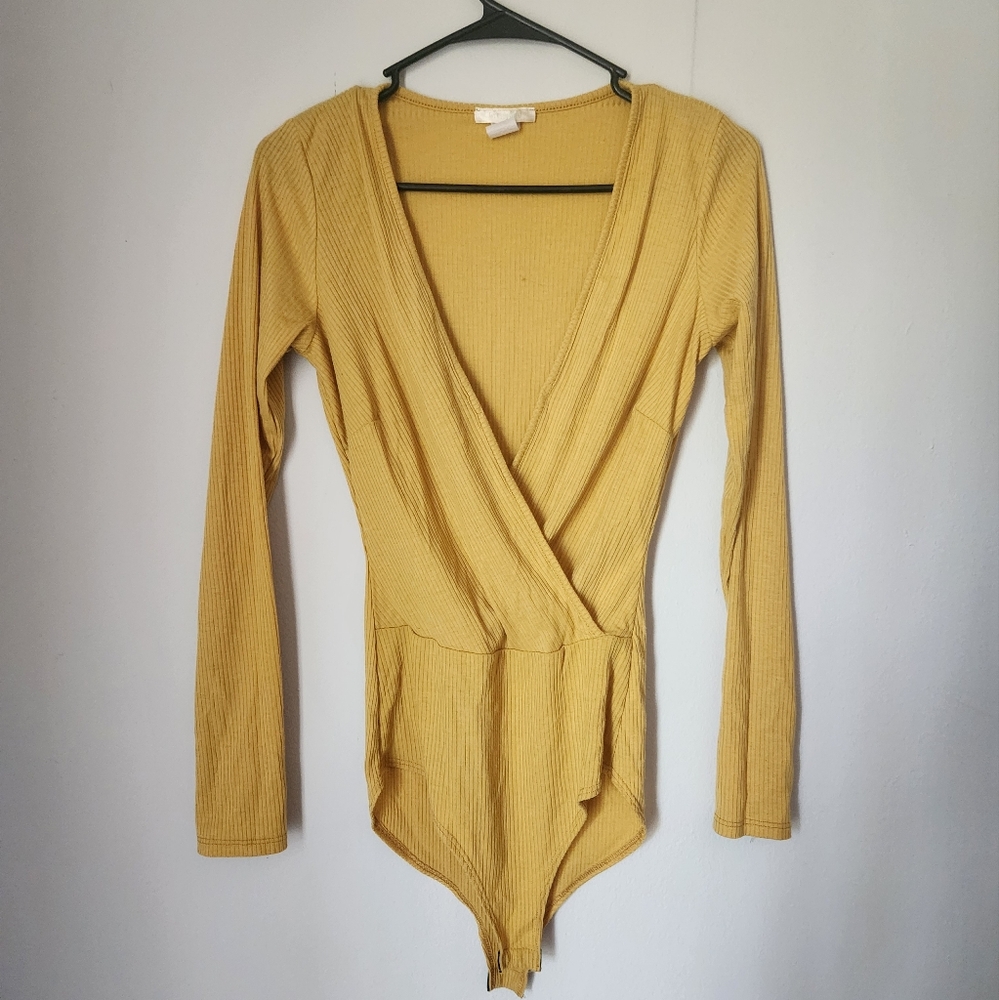 Yellow V cut body suit